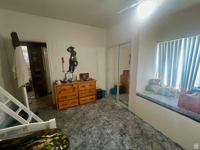 465 E Kings Ln, Green River, UT 84525 - carpeted bedroom featuring a closet, multiple windows, and ceiling fan