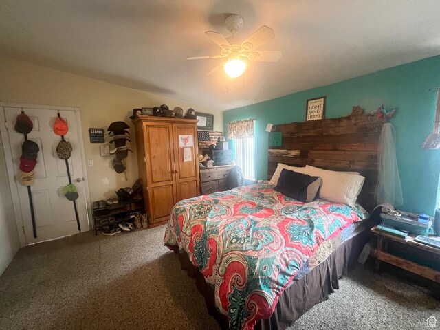 465 E Kings Ln, Green River, UT 84525 - carpeted bedroom with a ceiling fan and vaulted ceiling