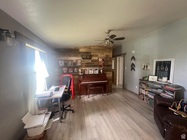 465 E Kings Ln, Green River, UT 84525 - office space with wood walls, wood finished floors, ceiling fan, and vaulted ceiling