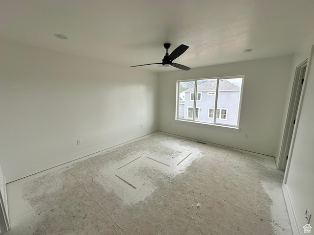 spare room featuring ceiling fan