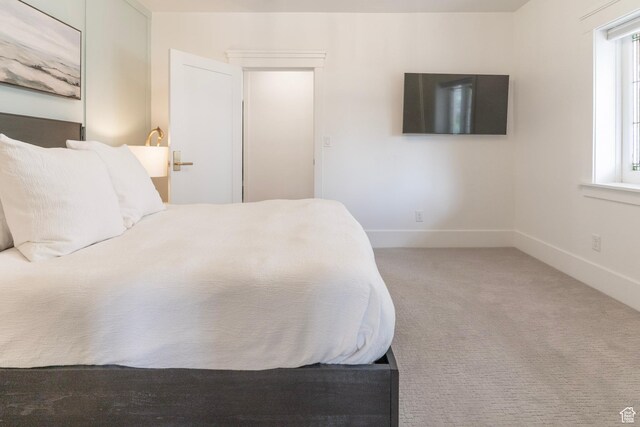 158 N State St, Salt Lake City, UT 84103 - bedroom with baseboards and carpet flooring