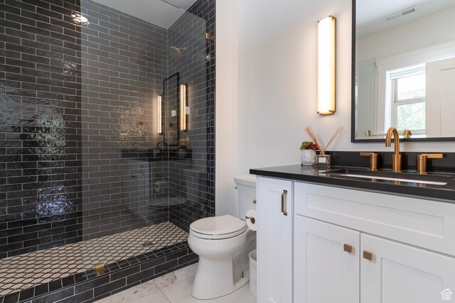 158 N State St, Salt Lake City, UT 84103 - full bath featuring toilet, tiled shower, and vanity