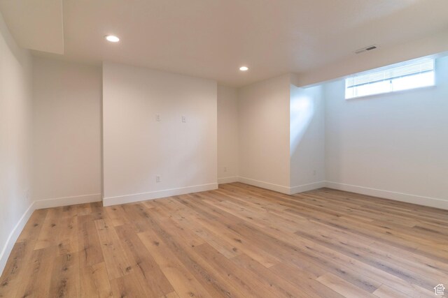 158 N State St, Salt Lake City, UT 84103 - empty room with light wood-style floors, recessed lighting, and baseboards