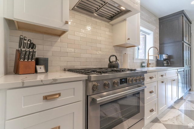 158 N State St, Salt Lake City, UT 84103 - kitchen with appliances with stainless steel finishes, premium range hood, a sink, backsplash, and light stone countertops