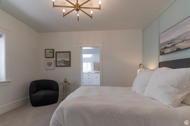 158 N State St, Salt Lake City, UT 84103 - bedroom featuring a chandelier, carpet floors, ensuite bathroom, and baseboards
