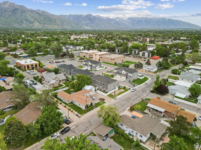 aerial view of residential area featuring mountains