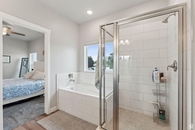 bathroom with connected bathroom, a stall shower, a bath, and wood finished floors
