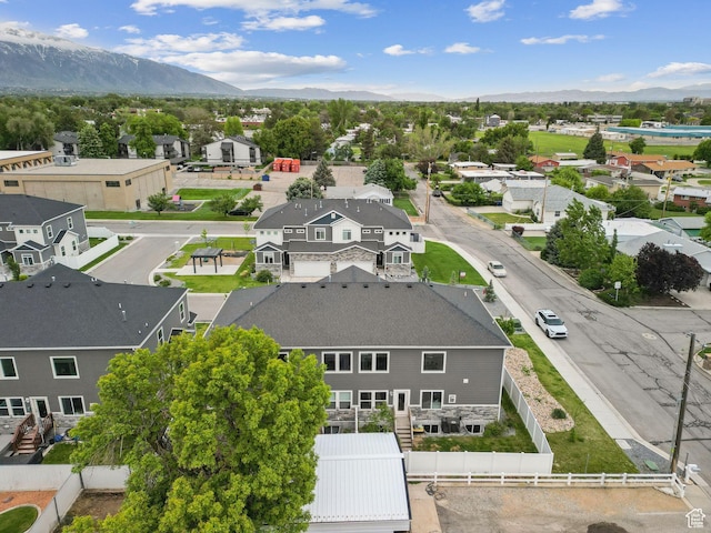 aerial perspective of suburban area featuring a mountain backdrop