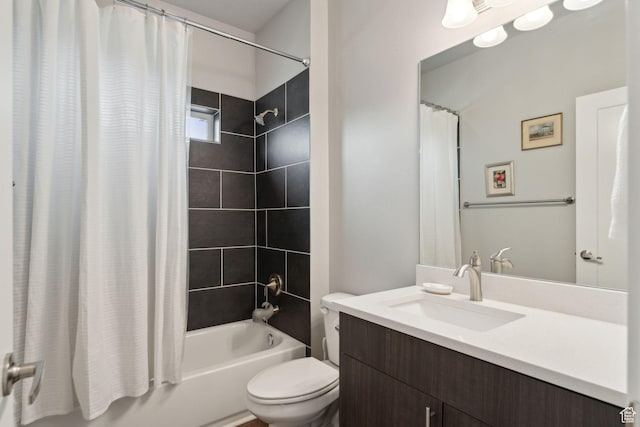 bathroom with toilet, shower / bathtub combination with curtain, and vanity