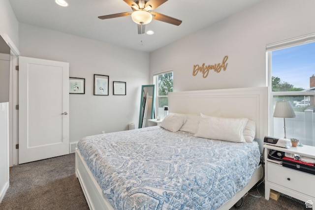 bedroom with dark colored carpet, recessed lighting, and a ceiling fan
