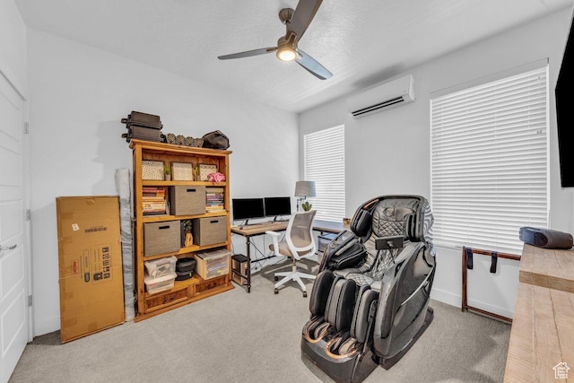 carpeted office space featuring an AC wall unit and ceiling fan