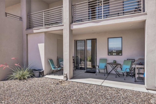 view of patio / terrace with a balcony
