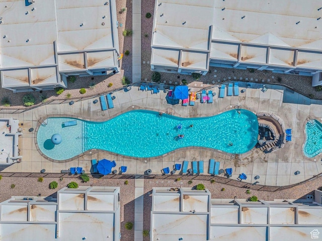 drone / aerial view of a pool