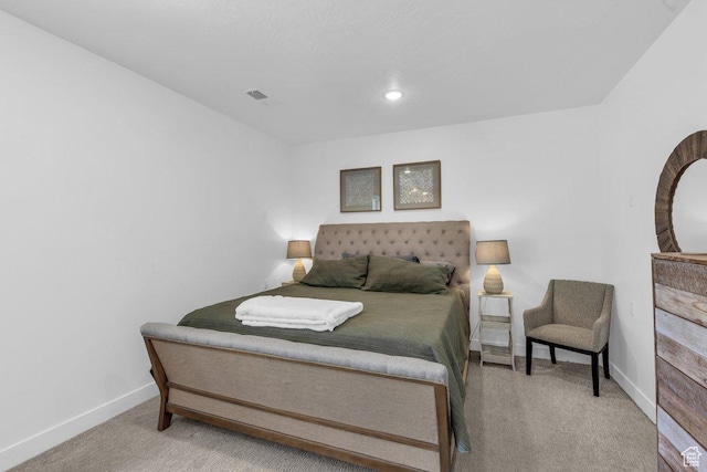 carpeted bedroom with baseboards and recessed lighting