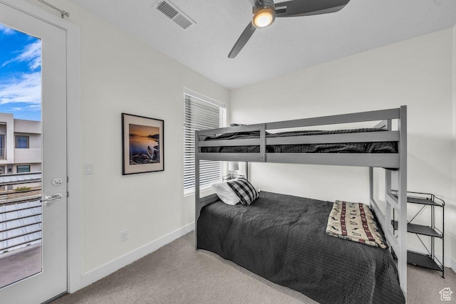 bedroom with carpet, baseboards, and ceiling fan