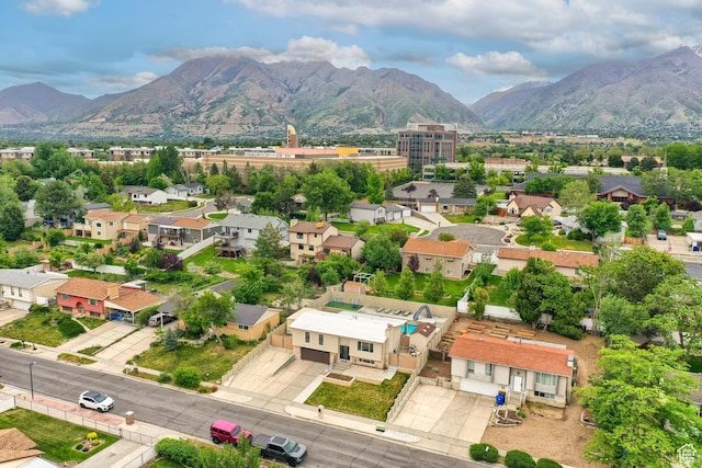 aerial view of residential area with a mountainous background
