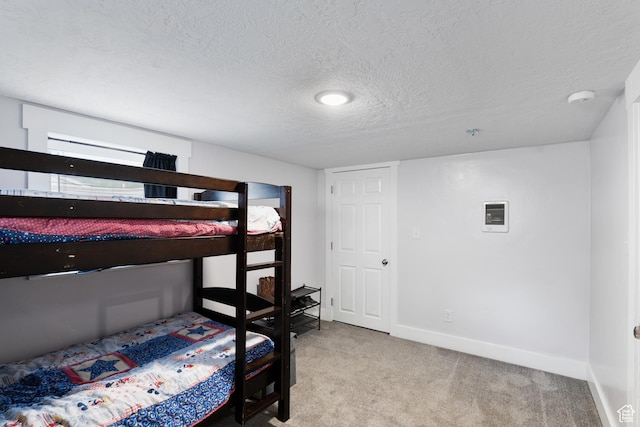 445 E Swenson Ave S, Springville, UT 84663 - bedroom featuring carpet floors, a textured ceiling, and baseboards