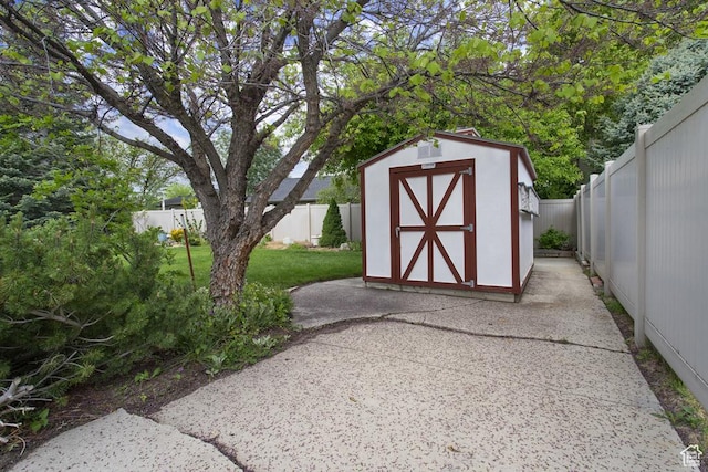 view of shed featuring a fenced backyard