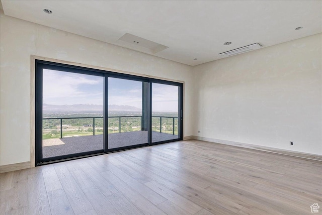 6078 S Heughs Canyon Way, Holladay, UT 84121 - unfurnished room featuring light wood-style floors and baseboards