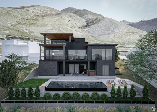 6078 S Heughs Canyon Way, Holladay, UT 84121 - back of property with a balcony and a mountain view