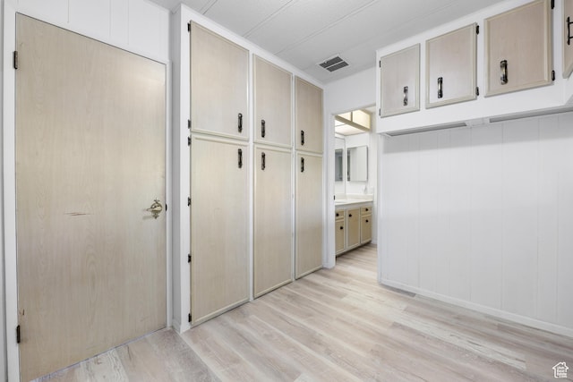 mudroom featuring light wood-style flooring