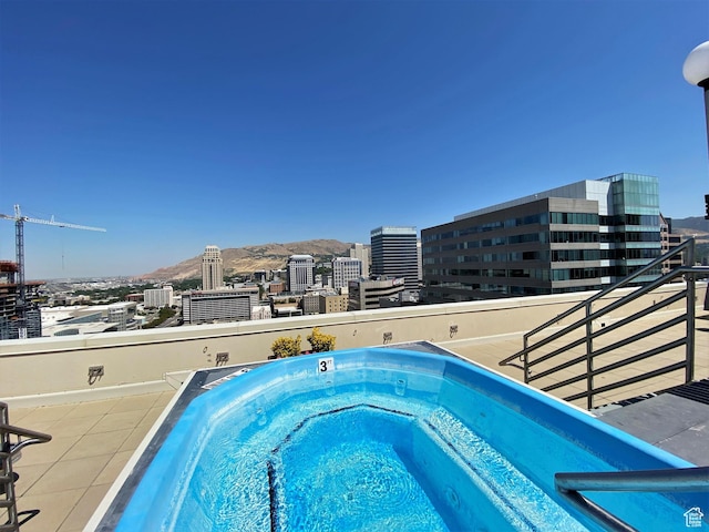 48 W Broadway Unit 1804N, Salt Lake City, UT 84101 - view of pool with a city view and an outdoor hot tub