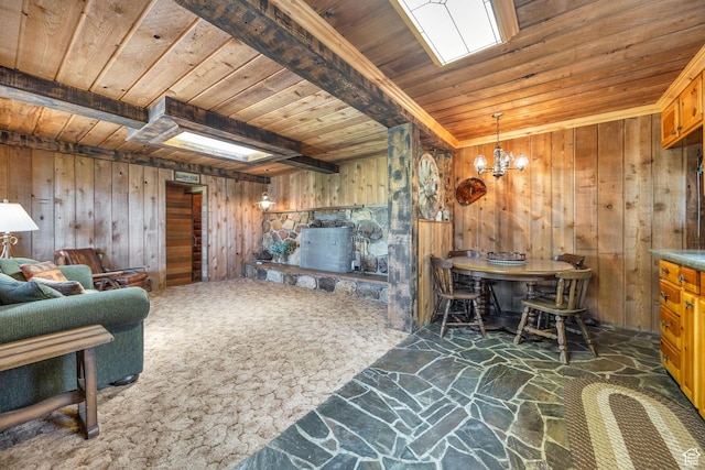 1456 E Weber Wild Rd, Oakley, UT 84055 - living room with wood ceiling, stone flooring, wooden walls, and a chandelier