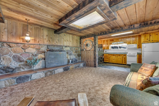 1456 E Weber Wild Rd, Oakley, UT 84055 - living room featuring wood ceiling, wooden walls, a skylight, and beamed ceiling