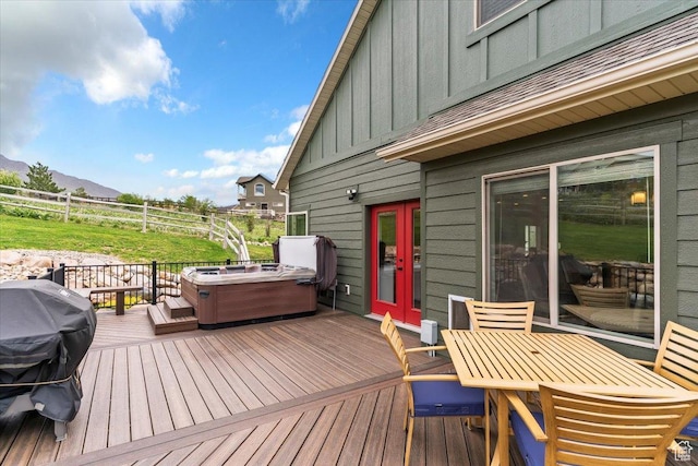 4026 E 4325 N, Eden, UT 84310 - wooden deck featuring a hot tub, outdoor dining area, a mountain view, area for grilling, and fence