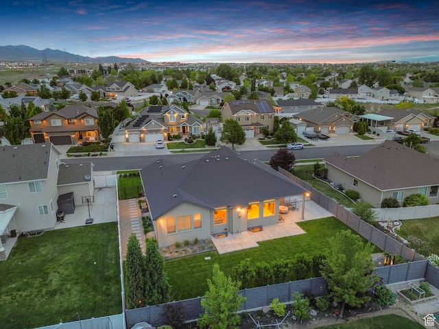 aerial perspective of suburban area featuring a mountain backdrop