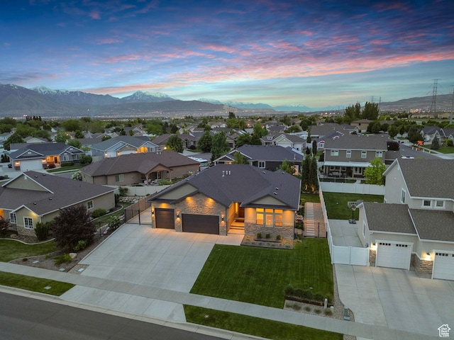 aerial view of residential area with mountains