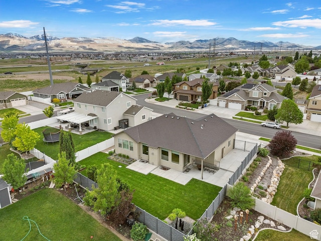 aerial perspective of suburban area with mountains
