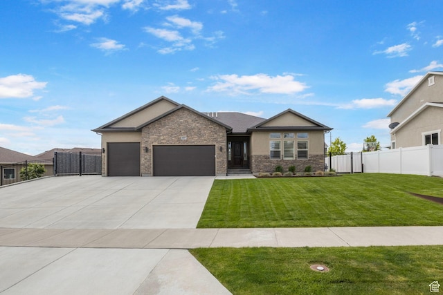 view of front of home with an attached garage, concrete driveway, and stone siding