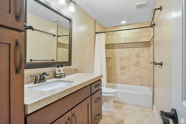 full bath with tile patterned floors, shower / bathtub combination with curtain, toilet, and vanity