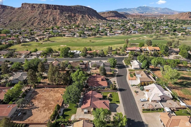 3526 S 1470 W, St George, UT 84790 - aerial overview of property's location with nearby suburban area, a mountain backdrop, and a local golf course