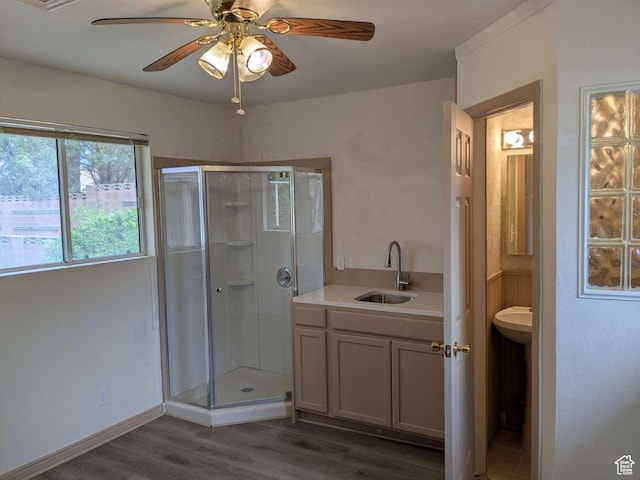 3526 S 1470 W, St George, UT 84790 - bathroom featuring a sink, a shower stall, wood finished floors, and ceiling fan