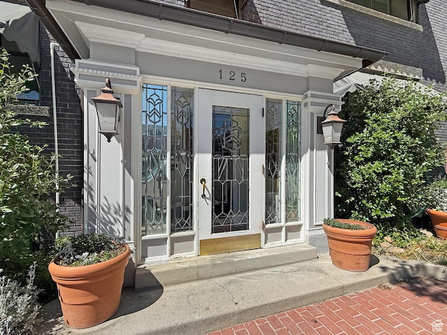 125 E 1st Ave Unit 206, Salt Lake City, UT 84103 - property entrance featuring brick siding and mansard roof