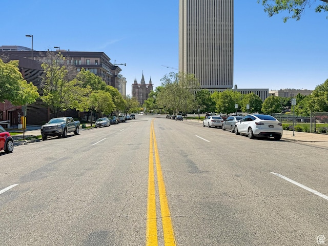 125 E 1st Ave Unit 206, Salt Lake City, UT 84103 - view of asphalt street featuring street lights, curbs, and sidewalks
