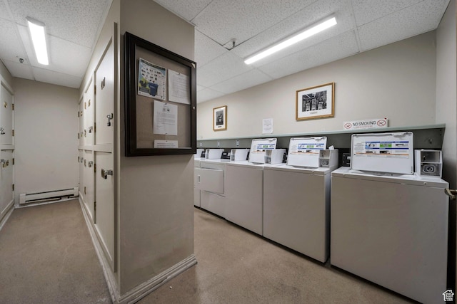 125 E 1st Ave Unit 206, Salt Lake City, UT 84103 - shared laundry with a baseboard radiator, separate washer and dryer, and baseboards