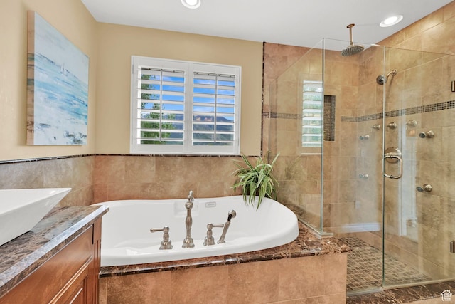 857 E 3250 N, North Ogden, UT 84414 - bathroom with a shower stall, a bath, vanity, and recessed lighting
