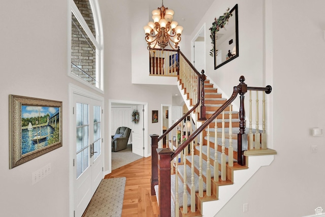 857 E 3250 N, North Ogden, UT 84414 - foyer entrance with a high ceiling, a chandelier, stairway, and baseboards