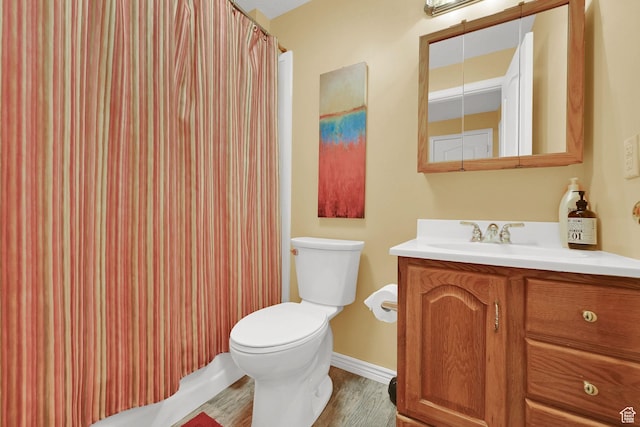 857 E 3250 N, North Ogden, UT 84414 - bathroom featuring wood finished floors, toilet, vanity, baseboards, and a shower with shower curtain
