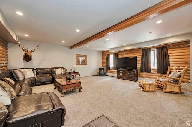 carpeted living area with log walls, recessed lighting, beamed ceiling, a wood stove, and baseboards