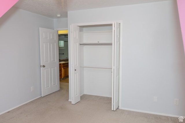 135 N 3rd E, Preston, ID 83263 - unfurnished bedroom with carpet, a closet, and baseboards