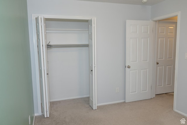 135 N 3rd E, Preston, ID 83263 - unfurnished bedroom featuring carpet, a closet, and baseboards
