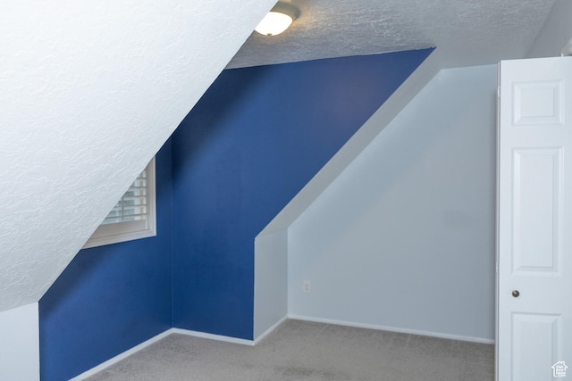 135 N 3rd E, Preston, ID 83263 - bonus room featuring a textured ceiling, carpet flooring, and baseboards
