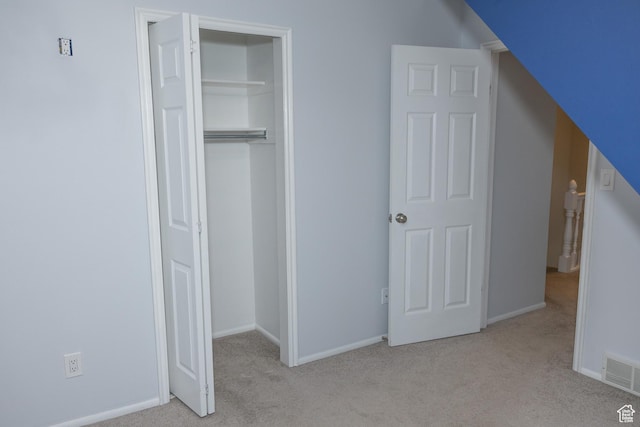 135 N 3rd E, Preston, ID 83263 - unfurnished bedroom featuring carpet flooring, a closet, and baseboards