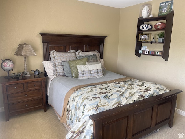 bedroom with light colored carpet