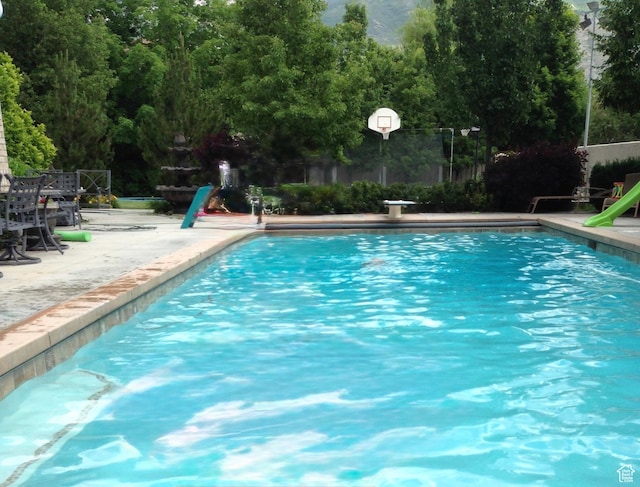 swimming pool featuring a patio