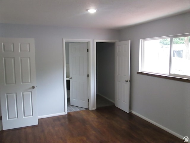4872 N Burch Creek Dr, South Ogden, UT 84403 - unfurnished bedroom featuring baseboards, wood finished floors, and recessed lighting